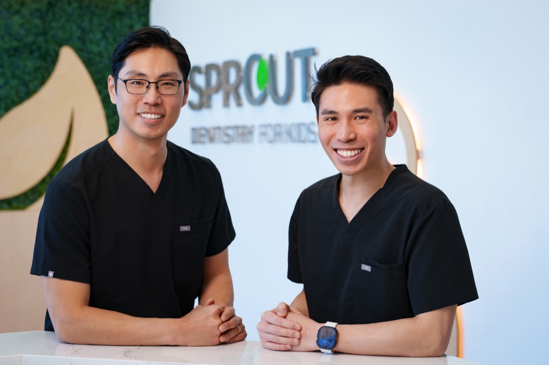 Two dentists photographed in their practice